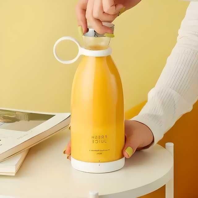 Electric Portable Mini Juicer Bottle - 4 Blades